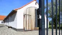 MODULEC_SA__On_anthracite_gate_by_farm__1920x1080px.webp